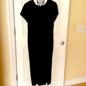 Long black dress with button blackout.  Backout cover with netting.